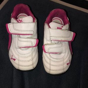 White with pink striped Pumas